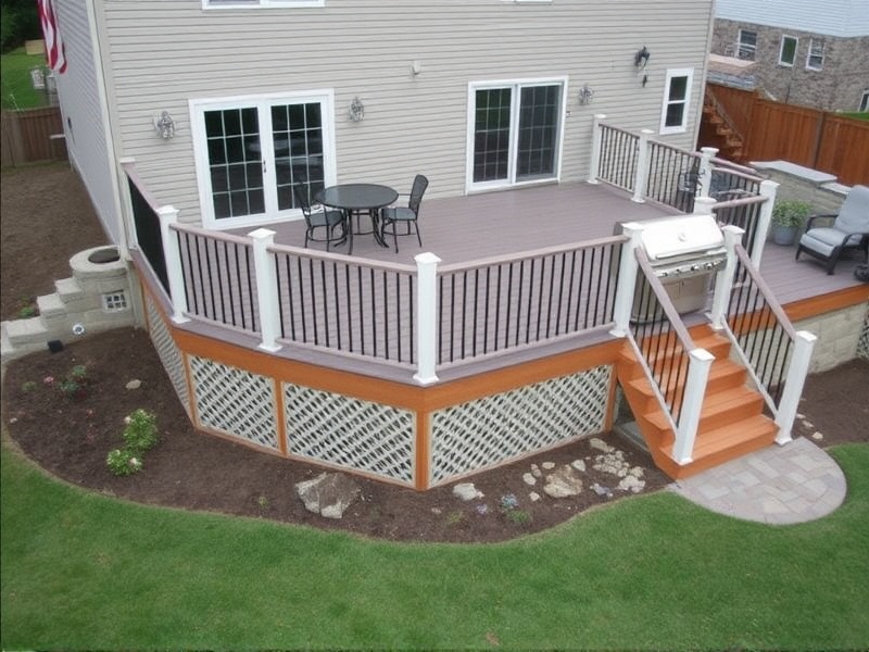 composite decking over basement walkout and builtin grill